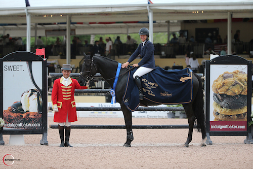 Beezie Madden and Cortes 'C' in their winning presentation with ringmaster Gustavo Murcia
