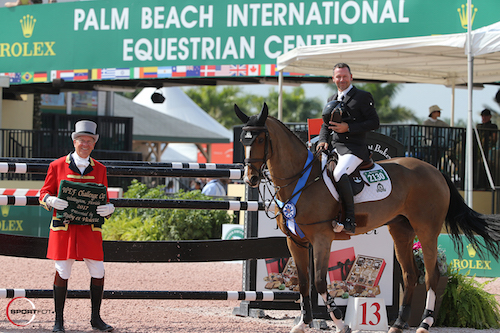 Eric Lamaze and Fine Lady 5 in their winning presentation with ringmaster Steve Rector.