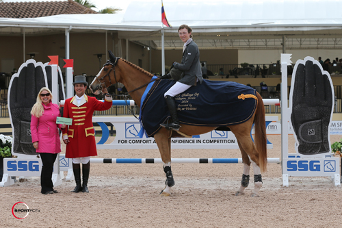Wilton Porter and Paloubet in their winning presentation with SSG representative Jennifer Ward and ringmaster Gustavo Murcia