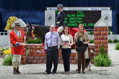 Amy Zettler and Glad Rags winning last year's $10,000 WIHS Adult Hunter Championship. Photo © Shawn McMillen Photography.