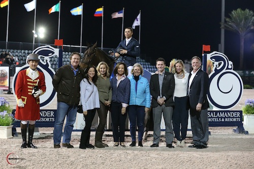 Kent Farrington and Blue Angel in their winning presentation with ringmaster Gustavo Murcia, Equestrian Sport Productions CEO Mark Bellissimo, Ellen Crown, Katherine Bellissimo, Robin Parsky, Lisa Lourie, Matt Owen and Julie Banner of Salamander Hotels & Resorts, and Rob Banner