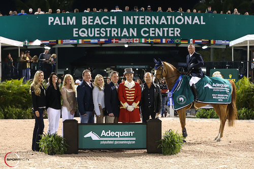 Todd Minikus and Babalou 41 in their winning presentation with (left to right) Audrey Bolte, Associate Brand Manager for Luitpold Animal Health, Caroline Hogan, Kathy Serio, Senior Territory Manager for Luitpold Animal Health, Equestrian Sport Productions CEO Mark Bellissimo, Wellington Equestrian Partners principal Katherine Bellissimo, Allyn Mann, Director, Luitpold Animal Health, ringmaster Christian Craig, and Babalou 41's owner Enrique Cadena.